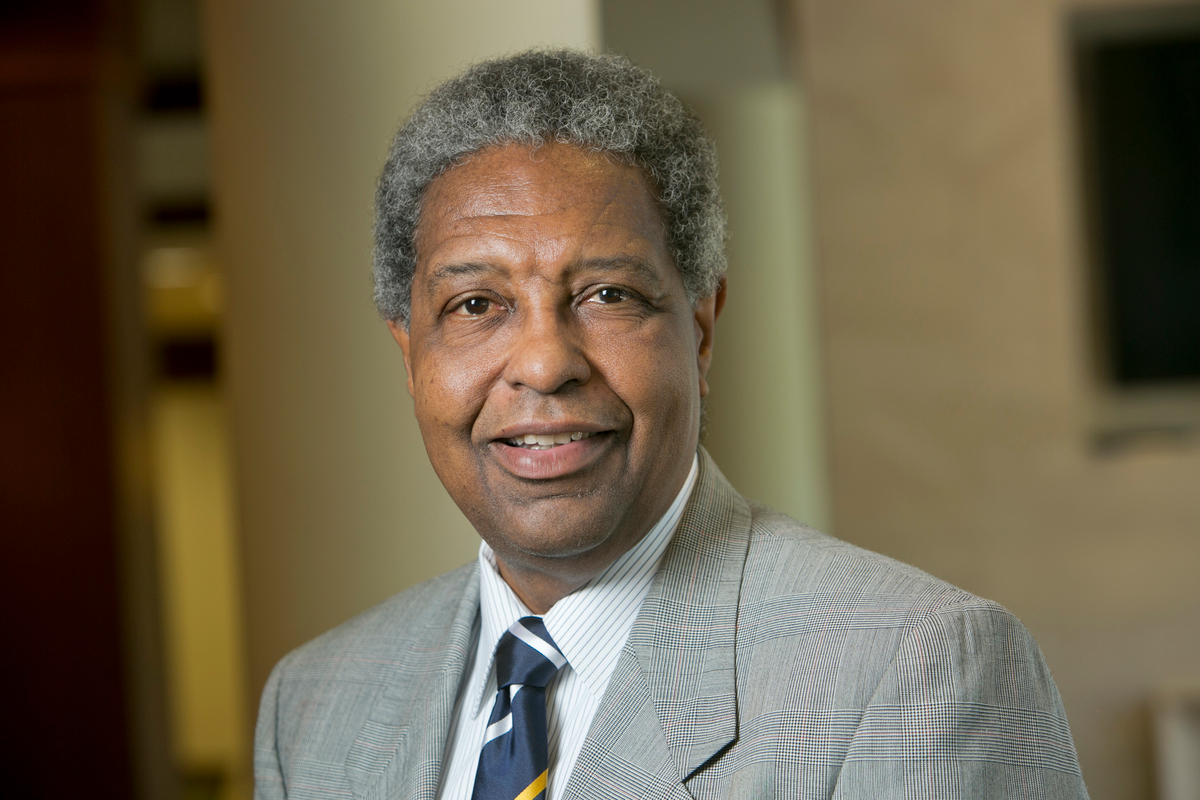 Professional headshot of Dr. William Darity