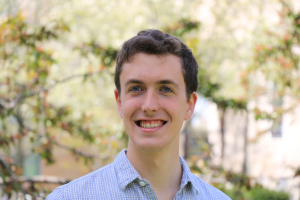 professional headshot of Will Damron