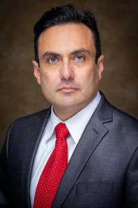 professional headshot of Alfredo Romero