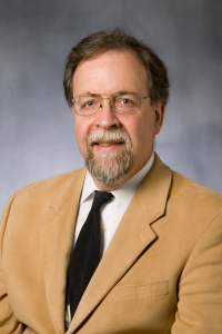 professional headshot of Charles Becker