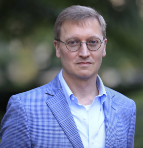 professional headshot of Douglas Almond