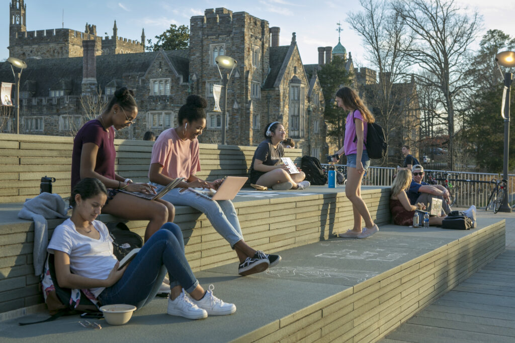 students studying outside on Duke's campus